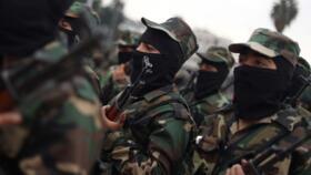 (File Photo) Graduates of Syria's General Security forces under the country's new administration attend a ceremony in the northern city of Aleppo.