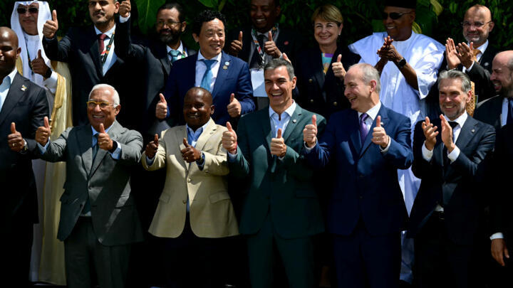(L to R, first row) European Council President Antonio Costa, Kenya's Vice President Abraham Kithure Kindiki, Spain's Prime Minister Pedro Sanchez, Ireland's Prime Minister Micheal Martin and the Netherlands' outgoing Prime Minister Dick Schoof pose for the family photo at the Leaders Summit ahead of the COP30 UN climate conference in Belem, Para State, Brazil on November 7, 2025.