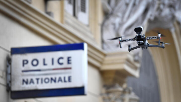 A Police drone flies over Marseille's Capucins market during the nationwide COVID lockdown on March 24, 2020.