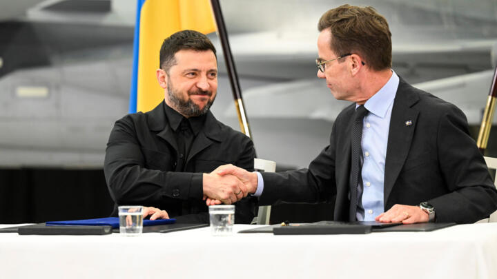 Sweden's Prime Minister Ulf Kristersson, right and Ukrainian President Volodymyr Zelenskyy hold a joint press conference following their meeting and visit to Saab, in LinkÃ¶ping, Sweden, Oc