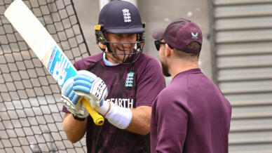 England's Joe Root and coach Brendan McCullum during practice at the Melbourne Cricket Ground on Tuesday