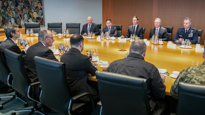 Ukraine's President Volodymyr Zelensky, with German Chancellor Friedrich Merz next to him, in talks with the US delegation, led by special envoy Steve Witkoff and President Donald Trump's son-in-law J