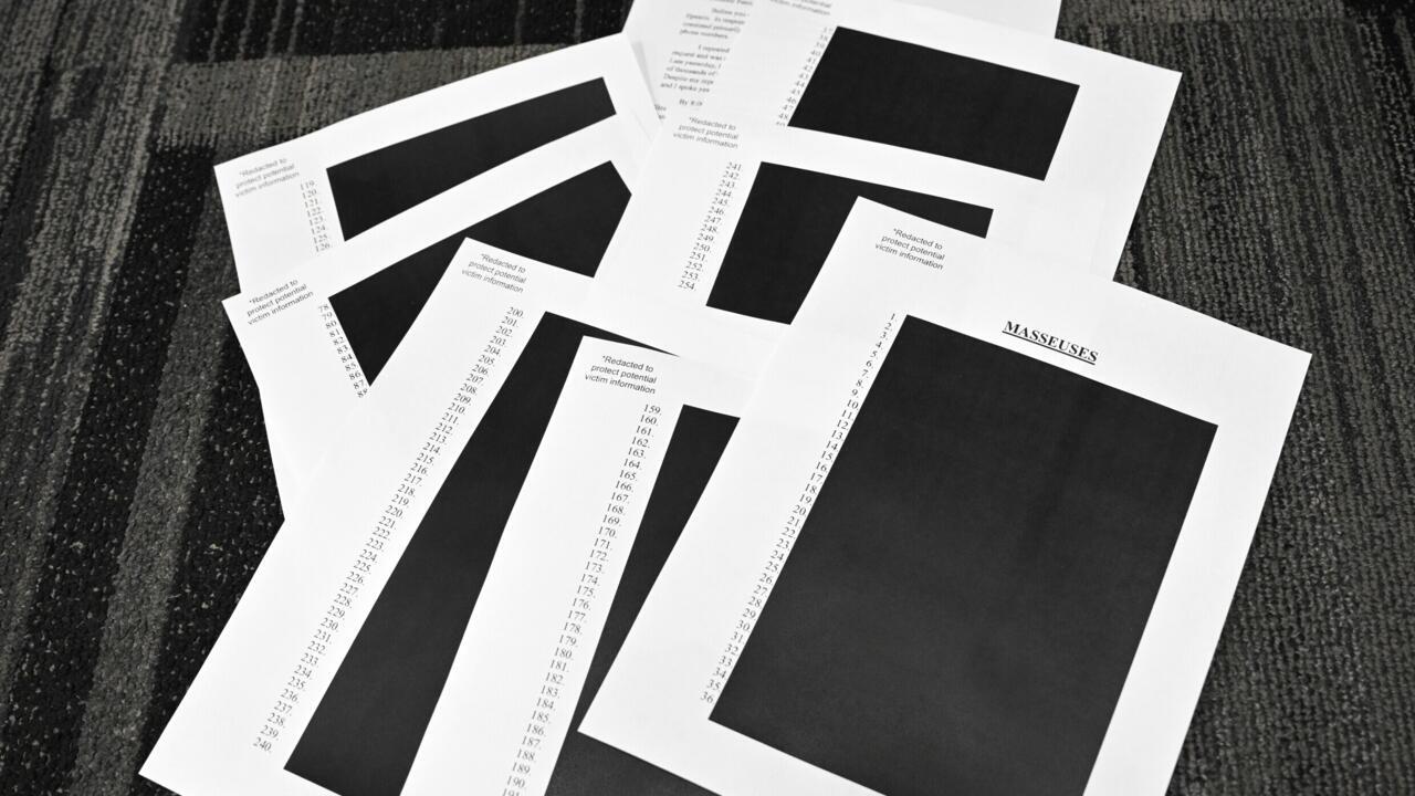 Redacted documents after the US Justice Department began releasing the long-awaited records from the investigation into the politically explosive case of convicted sex offender Jeffrey Epstein