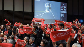 Employees of 'ispace' react as they wait for the signal from the touchdown of its lunar lander Resilience on the Moon at a venue to watch its landing in Tokyo, Japan on June 6, 2025.
