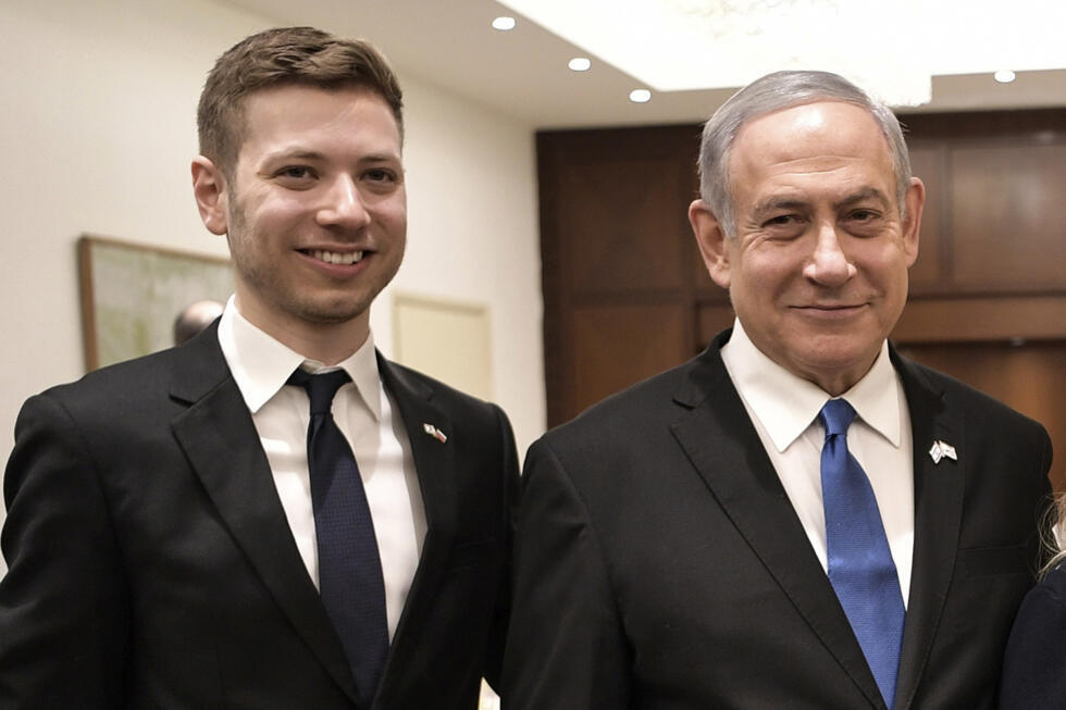 File photo of Israeli Prime Minister Binyamin Netanyahu and his son Yair taken on August 30, 2023.